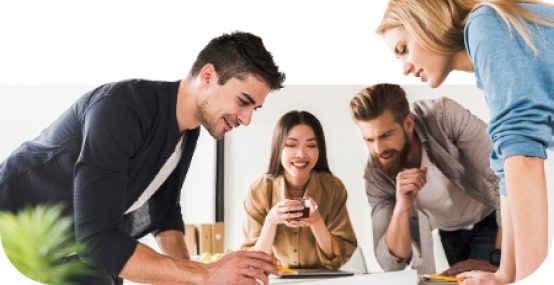 Project team collaborating around a laptop